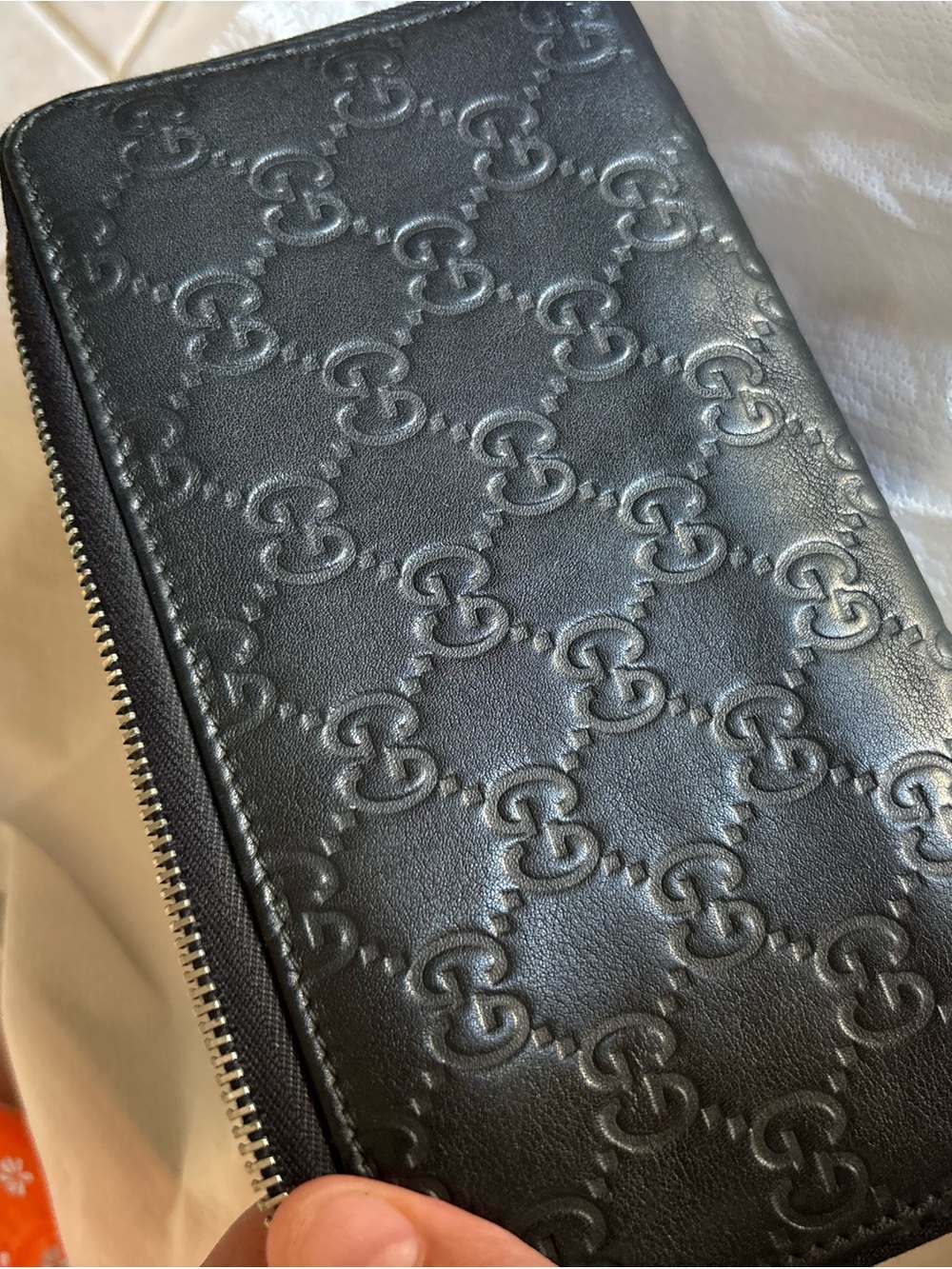 Gucci Black Embossed GG Zip Around Wallet